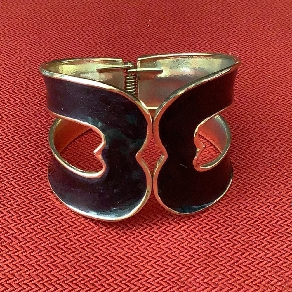 Black cuff bracelet with gold tone trim vintage